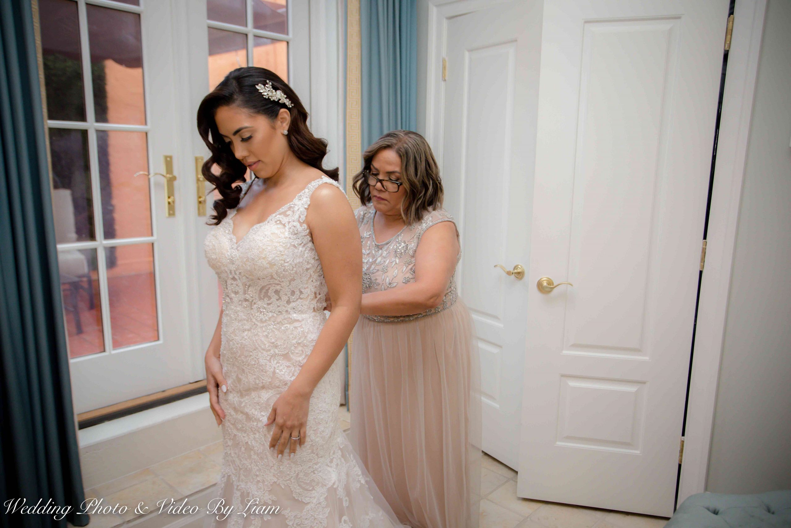 Bride Steps Into Her Wedding Dress